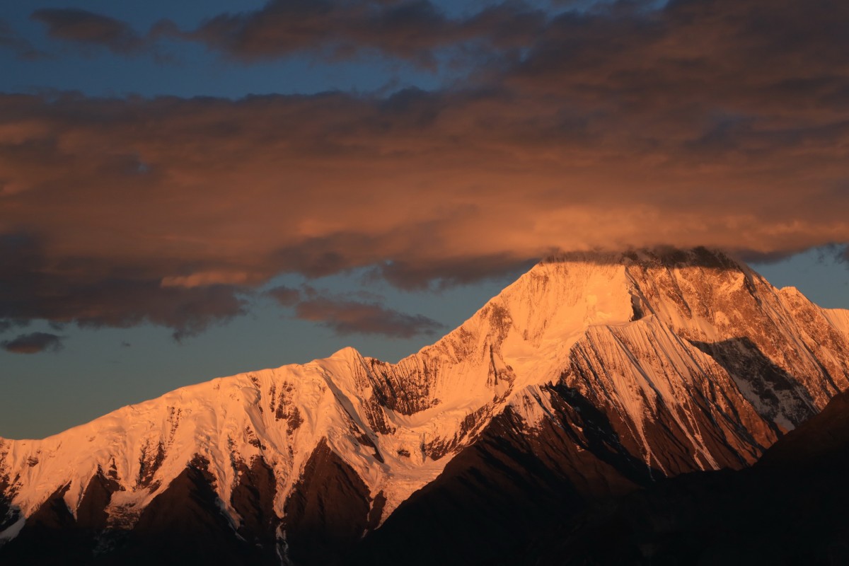 Panoramic View of Gongga Mountain from Zimei Pass at Sunset